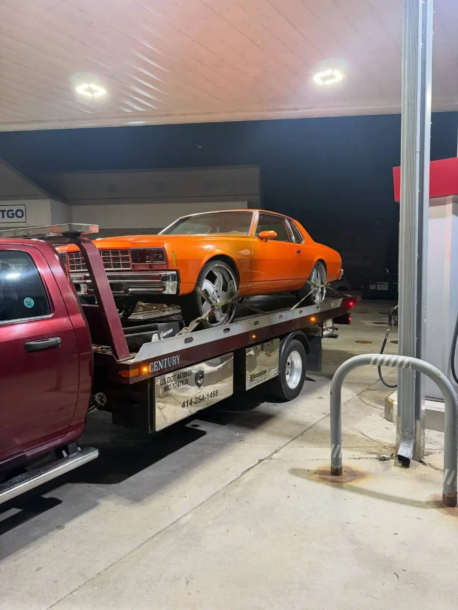 Classic coupe towed by PS Towing & Recovery